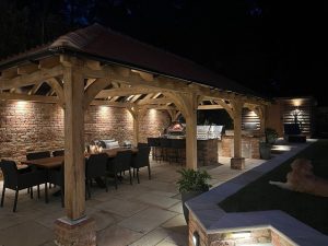 Oak gazebo with a hipped roof, offering ample outdoor space
