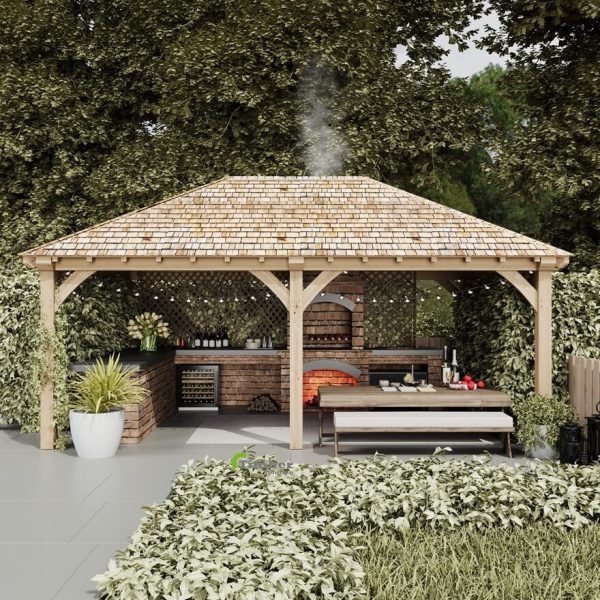 A 4x6 meter oak gazebo with a hipped roof, perfect for an outdoor kitchen, showcasing traditional craftsmanship from West Sussex.