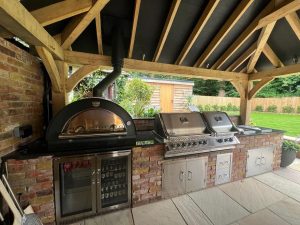 Beautiful oak gazebo with hipped roof, perfect for hosting events