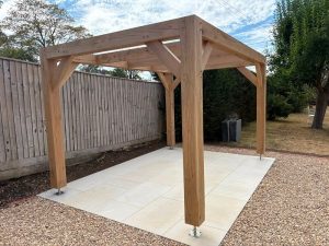 Bespoke modern oak pergola kit with solid oak posts and contemporary beams