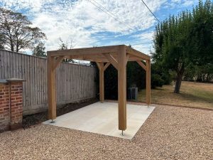 Modern oak pergola kit supplied with precision-cut timber components in the UK