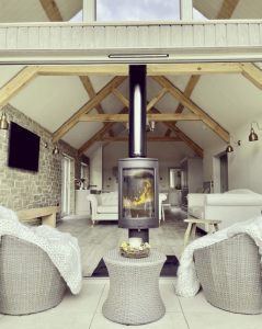 Close-up of an oak king post truss highlighting the raised tie feature for added stability