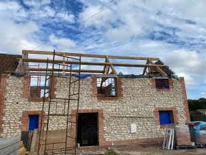Raised tie truss elevating ceiling height.