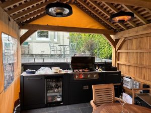English oak pavilion roof with oak battens and cedar shingles