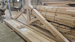 Raised tie king post truss with classic design and sturdy oak beams