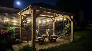 Oak hipped gazebo measuring 2.2 × 3.5 metres with composite roof tiles