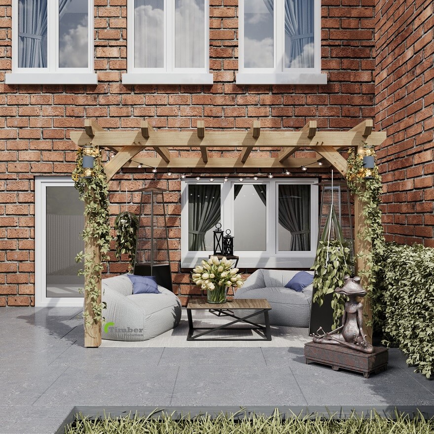 A beautifully designed oak lean-to pergola adorned with climbing plants and a strong lattice structure, perfect for outdoor gatherings.